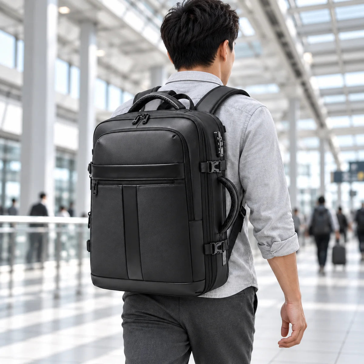 Black AirVault backpack worn in a station